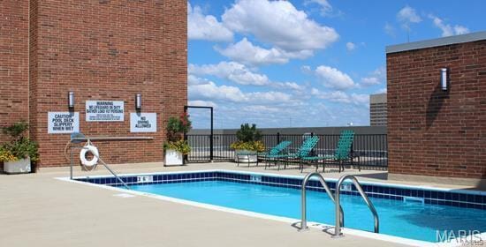 200 S Brentwood Unit 12F, Saint Louis, MO 63105 - community pool with fence and a patio area