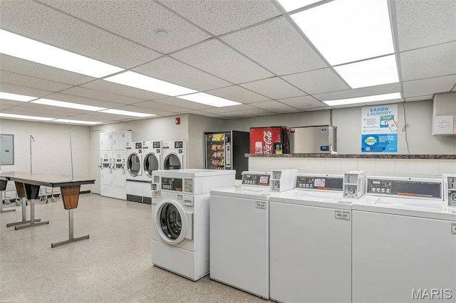 200 S Brentwood Unit 12F, Saint Louis, MO 63105 - community laundry featuring independent washer and dryer, electric panel, and light floors