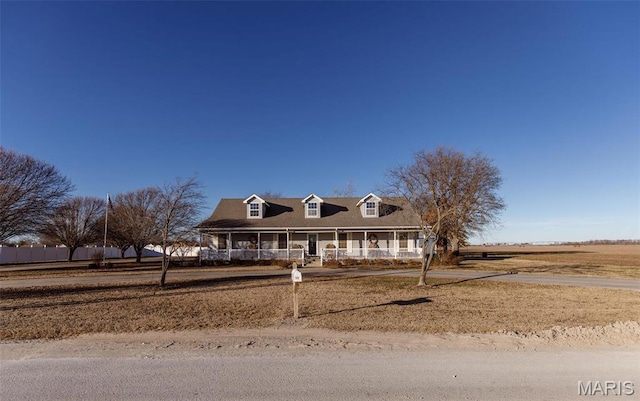 702 S 525th Rd, East Prairie, MO 63845 - cape cod house featuring a porch