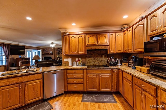 702 S 525th Rd, East Prairie, MO 63845 - kitchen with black appliances, a sink, light wood-style floors, ceiling fan, and brown cabinets