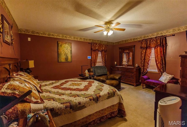 702 S 525th Rd, East Prairie, MO 63845 - bedroom with a textured ceiling, light carpet, and a ceiling fan