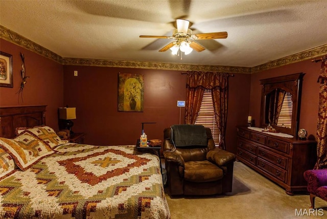 702 S 525th Rd, East Prairie, MO 63845 - bedroom with light carpet, a textured ceiling, and a ceiling fan