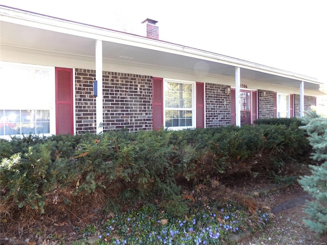 1306 Broadway St, Rolla, MO 65401 - entrance to property featuring brick siding and a chimney