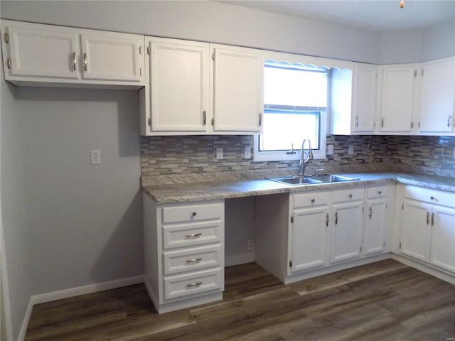1306 Broadway St, Rolla, MO 65401 - kitchen with a sink, white cabinetry, backsplash, and dark wood-style floors