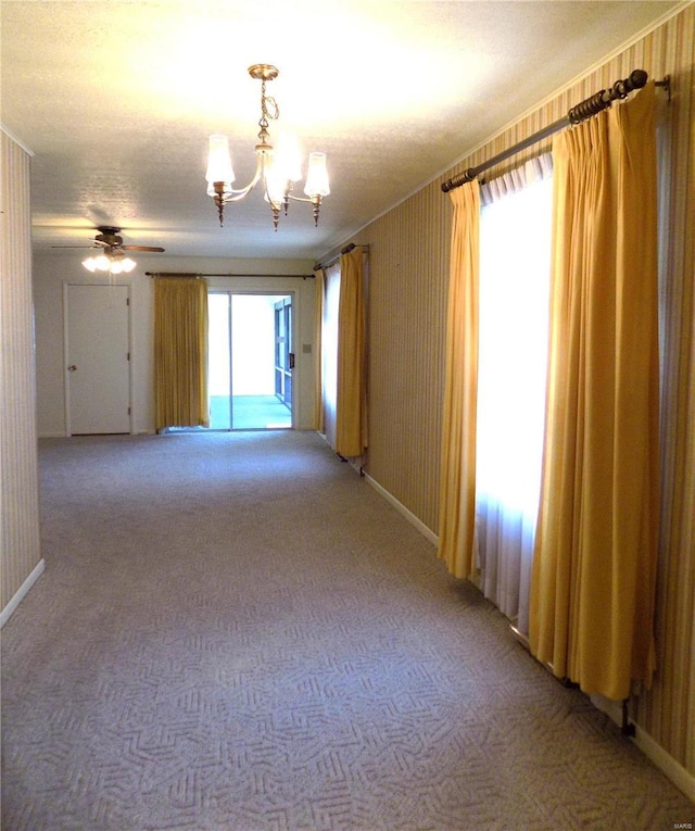 1306 Broadway St, Rolla, MO 65401 - spare room with light colored carpet, a chandelier, and baseboards