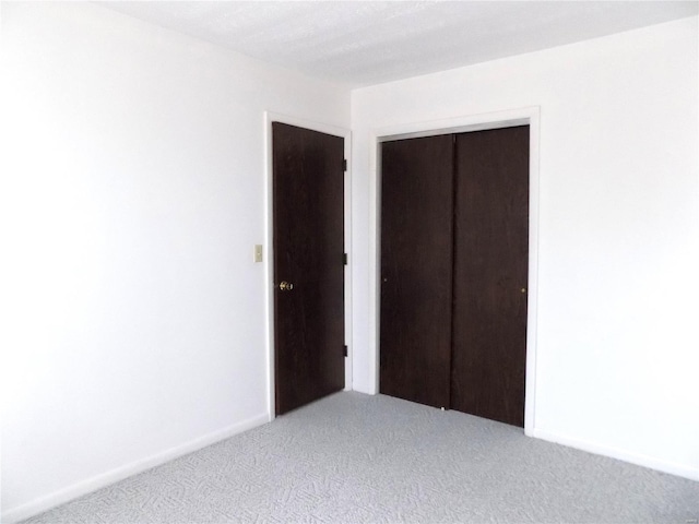 1306 Broadway St, Rolla, MO 65401 - unfurnished bedroom with carpet and a closet
