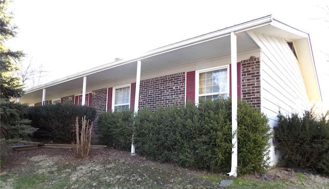 1306 Broadway St, Rolla, MO 65401 - view of home's exterior with brick siding