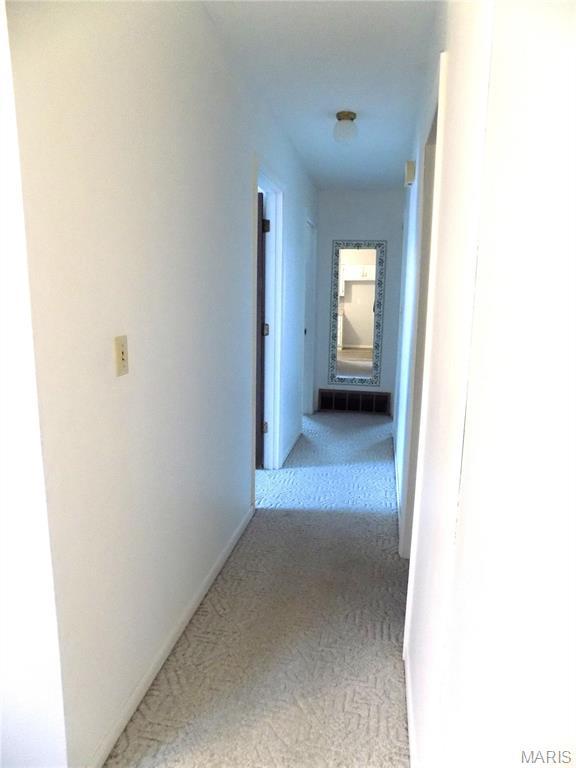 1306 Broadway St, Rolla, MO 65401 - corridor with carpet floors
