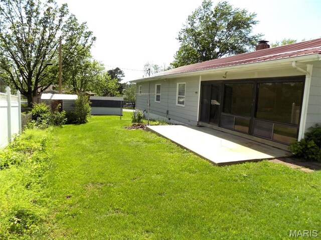 1306 Broadway St, Rolla, MO 65401 - view of yard featuring a patio