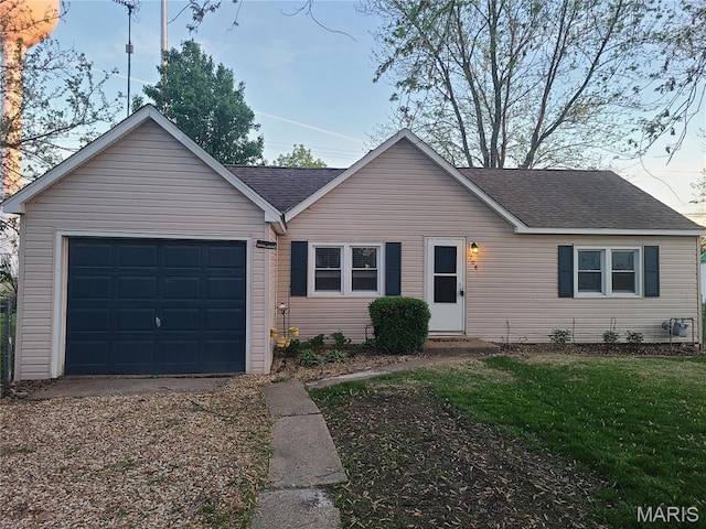 708 E Pear Ave, Owensville, MO 65066 - single story home featuring roof with shingles, a garage, a front yard, and driveway