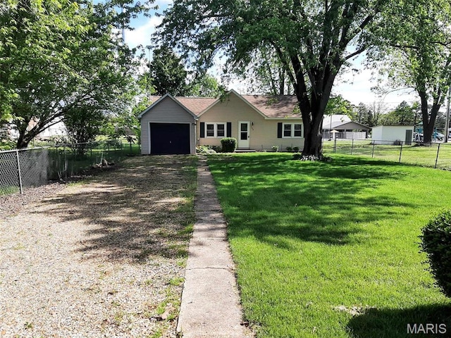 708 E Pear Ave, Owensville, MO 65066 - ranch-style house featuring driveway and an attached garage