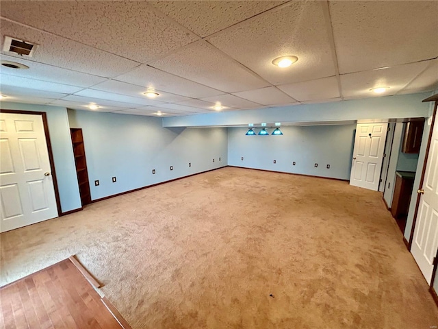 502 Mcclaren Way, Dixon, MO 65459 - finished below grade area with carpet flooring, baseboards, and a drop ceiling