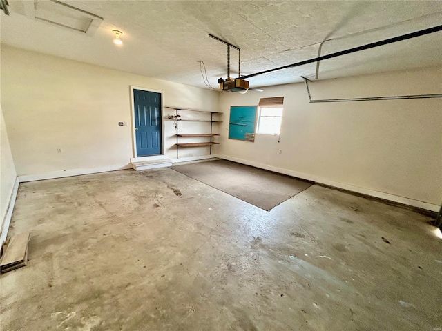 502 Mcclaren Way, Dixon, MO 65459 - garage with a garage door opener and baseboards