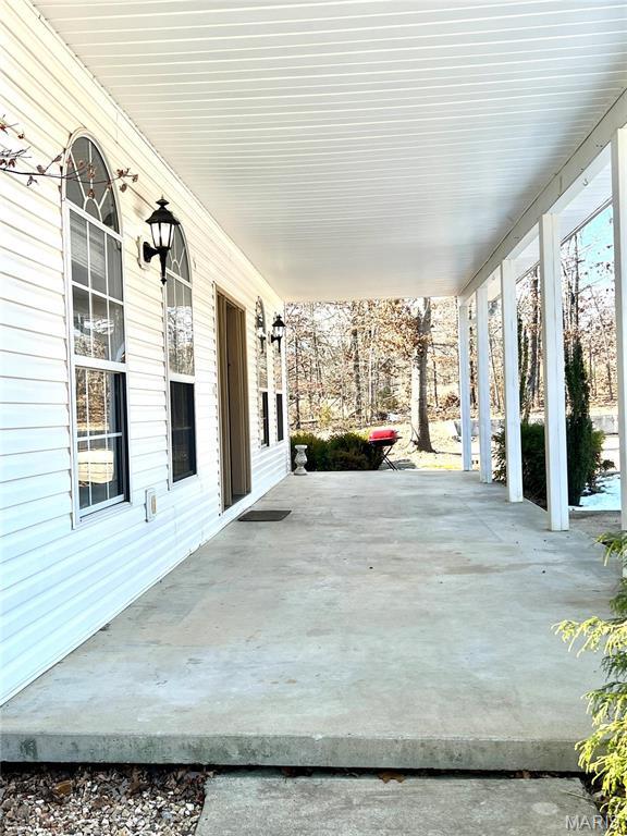 792 County Road 466, Poplar Bluff, MO 63901 - view of patio with a porch