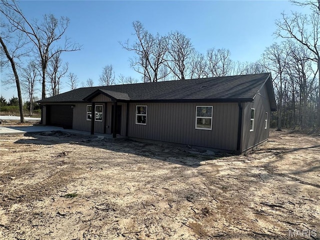 23332 Marvel, Lebanon, MO 65536 - view of front of property featuring concrete driveway, a garage, and roof with shingles