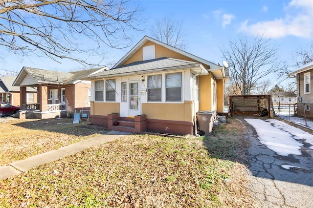 604 N Fountain St, Cape Girardeau, MO 63701 - bungalow-style home featuring stucco siding, driveway, and fence