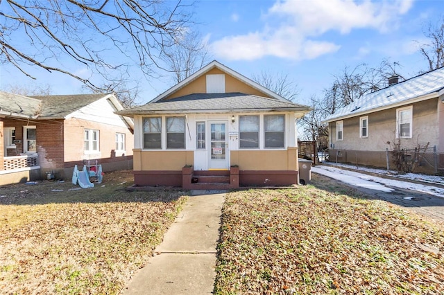 604 N Fountain St, Cape Girardeau, MO 63701 - bungalow-style home with entry steps, fence, and stucco siding