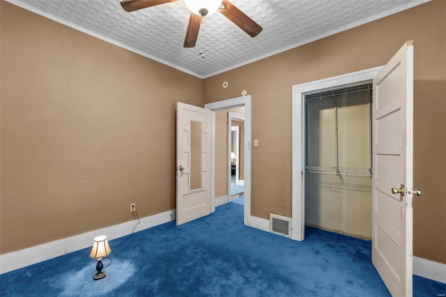 604 N Fountain St, Cape Girardeau, MO 63701 - unfurnished bedroom featuring crown molding, carpet, baseboards, a ceiling fan, and a closet