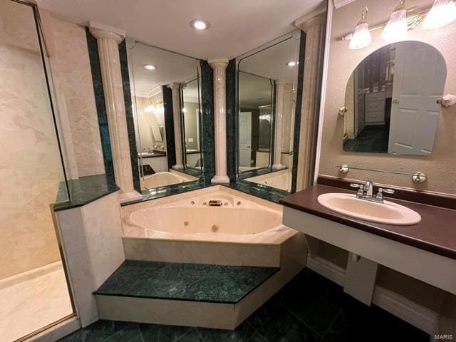 15800 State Highway Ad, Dexter, MO 63841 - bathroom featuring a sink, a whirlpool tub, walk in shower, recessed lighting, and marble finish flooring