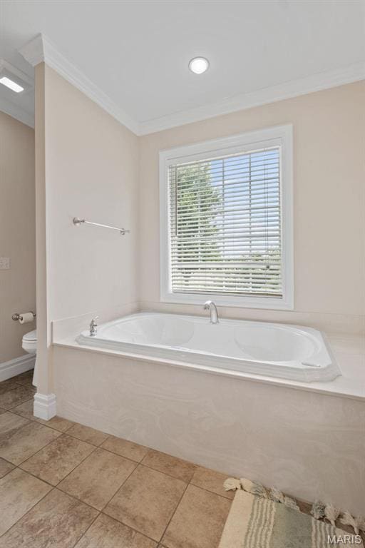 850 Aj Farm Ln, Washington, MO 63090 - bathroom with toilet, ornamental molding, a bath, baseboards, and tile patterned flooring