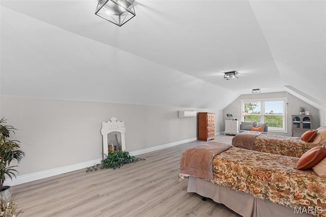 850 Aj Farm Ln, Washington, MO 63090 - bedroom with light wood-style floors, vaulted ceiling, baseboards, a wall mounted air conditioner, and a fireplace