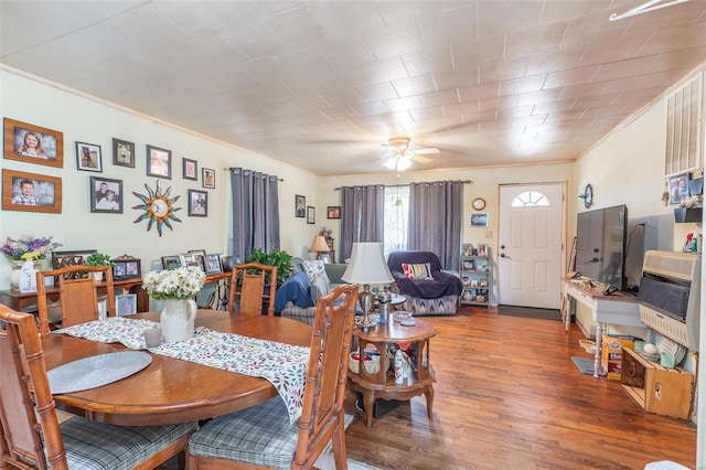 98 Ripley 160w-2, Doniphan, MO 63935 - dining room featuring crown molding, wood finished floors, and a ceiling fan