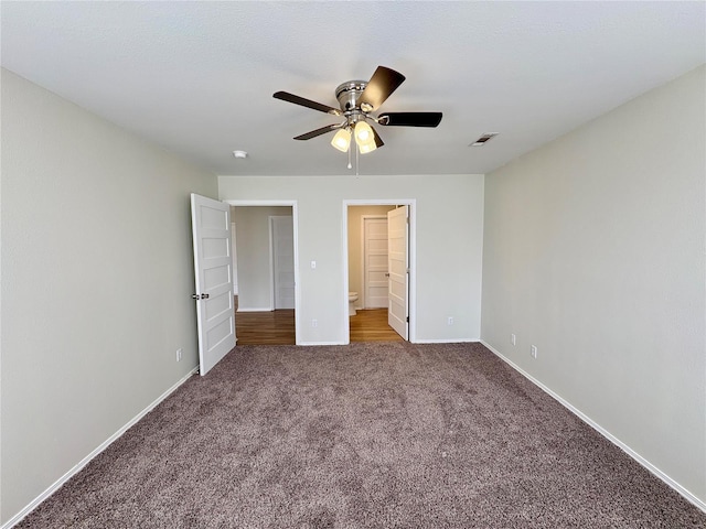 813 Breeze Ct, Perryville, MO 63775 - unfurnished bedroom featuring carpet floors, baseboards, ceiling fan, and connected bathroom
