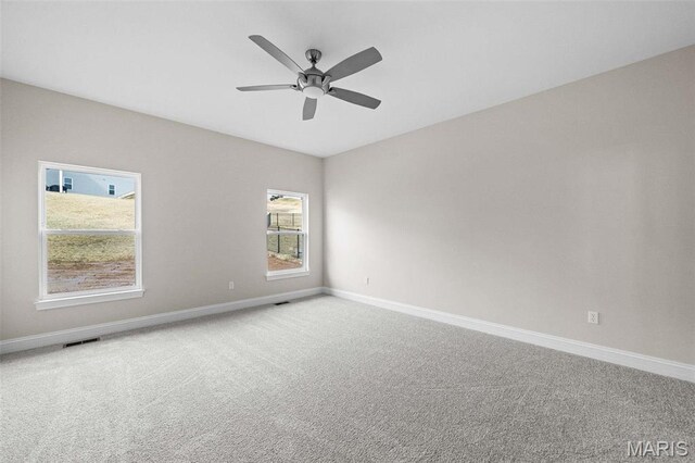 2995 Halls Green Dr, Washington, MO 63090 - empty room featuring baseboards, carpet flooring, and ceiling fan