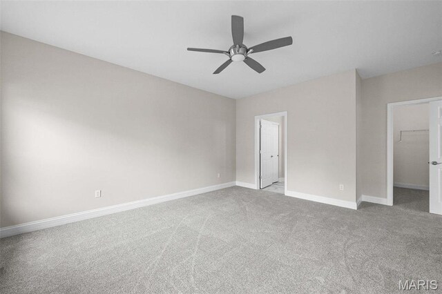 2995 Halls Green Dr, Washington, MO 63090 - unfurnished bedroom featuring carpet flooring, baseboards, a spacious closet, a ceiling fan, and a closet