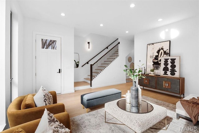 215 N Sarah St Unit 13, Saint Louis, MO 63108 - living room featuring light wood-style flooring, stairway, recessed lighting, and baseboards