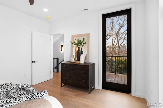 215 N Sarah St Unit 13, Saint Louis, MO 63108 - bedroom with light wood-style flooring, access to exterior, and recessed lighting