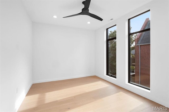 215 N Sarah St Unit 13, Saint Louis, MO 63108 - empty room featuring light wood-type flooring, recessed lighting, a ceiling fan, and baseboards