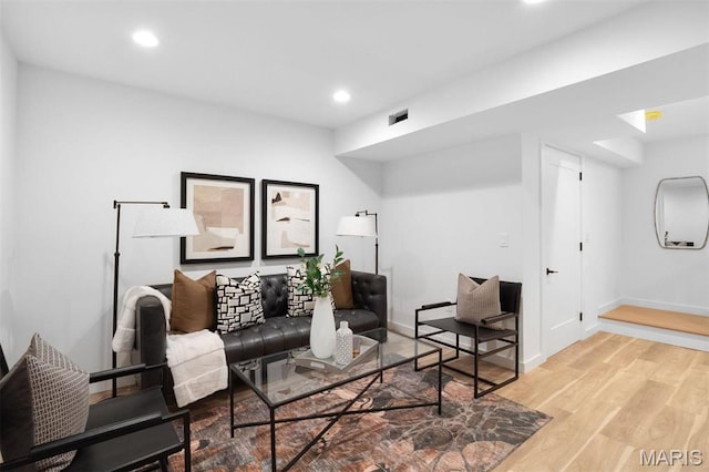 215 N Sarah St Unit 13, Saint Louis, MO 63108 - living area featuring wood finished floors, recessed lighting, and baseboards