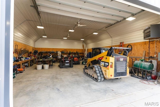 13112 Heritage Ln, Pocahontas, IL 62275 - garage with a heating unit, a workshop area, and wood walls