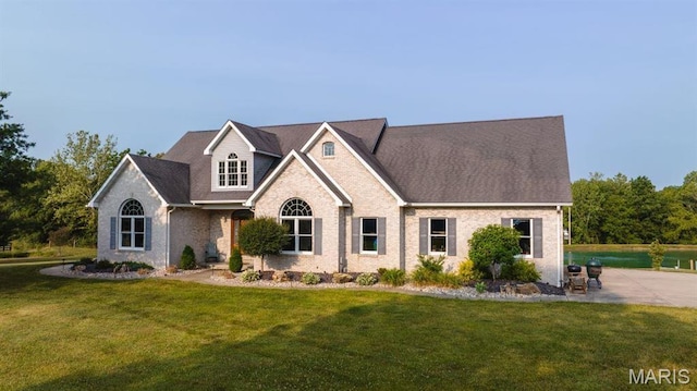 13112 Heritage Ln, Pocahontas, IL 62275 - view of front of home with a front yard and brick siding