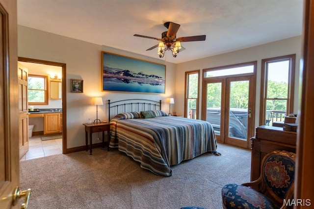 13112 Heritage Ln, Pocahontas, IL 62275 - bedroom featuring light carpet, access to outside, connected bathroom, baseboards, and a ceiling fan
