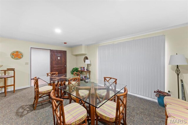 950 E Rue De La Banque Unit 110, Creve Coeur, MO 63141 - dining area with carpet floors and baseboards