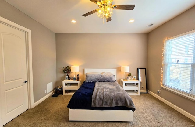 bedroom featuring multiple windows, carpet floors, recessed lighting, and baseboards