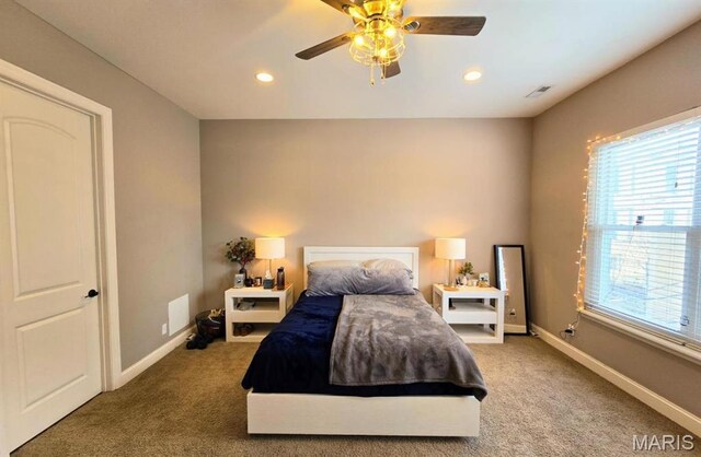 6416 Cates Ave, Saint Louis, MO 63130 - bedroom featuring multiple windows, carpet, recessed lighting, and baseboards