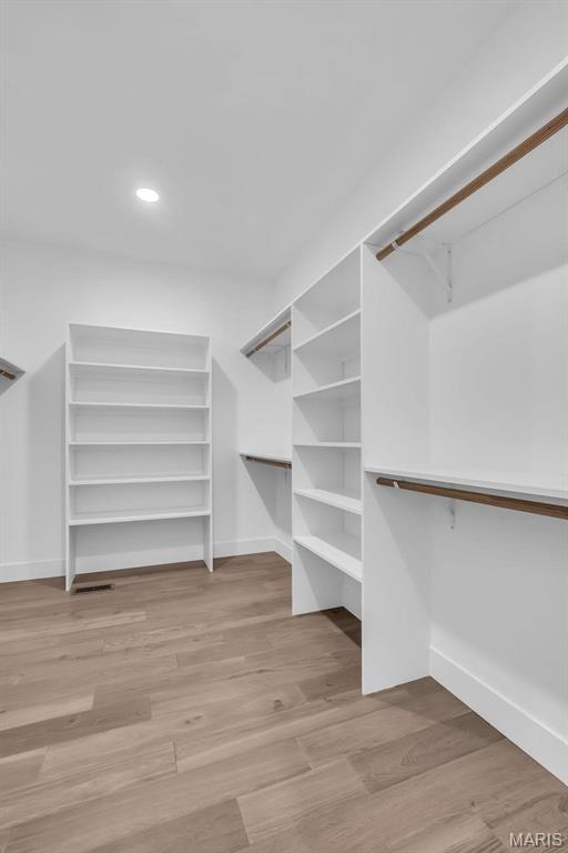 600 Legacy Dr, Waterloo, IL 62298 - walk in closet with wood finished floors