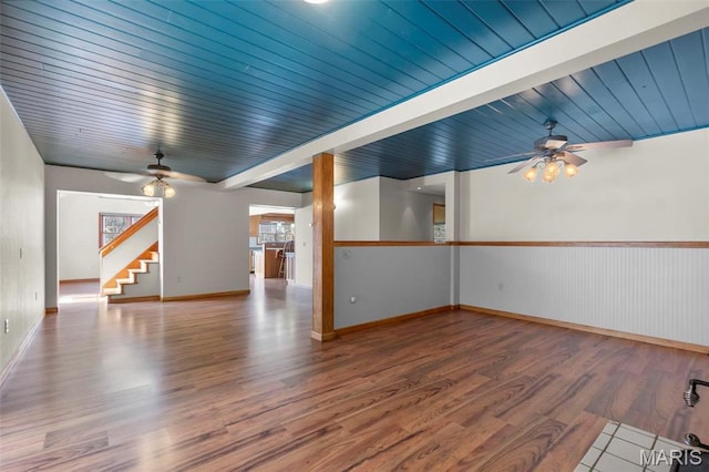 520 Christopher Dr, Perryville, MO 63775 - unfurnished room featuring a ceiling fan, wood finished floors, stairway, and baseboards