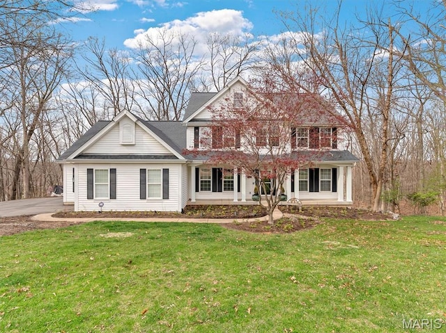 997 Sheffield Forest Ct, Wildwood, MO 63021 - view of front facade with covered porch and a front lawn