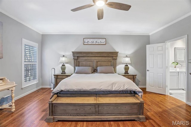 997 Sheffield Forest Ct, Wildwood, MO 63021 - bedroom with wood finished floors, ornamental molding, baseboards, ceiling fan, and connected bathroom