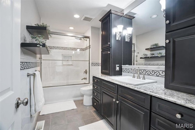 997 Sheffield Forest Ct, Wildwood, MO 63021 - bathroom featuring vanity, bathtub / shower combination, tile patterned flooring, toilet, and recessed lighting