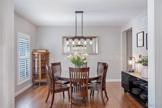 997 Sheffield Forest Ct, Wildwood, MO 63021 - dining room featuring wood finished floors and a chandelier