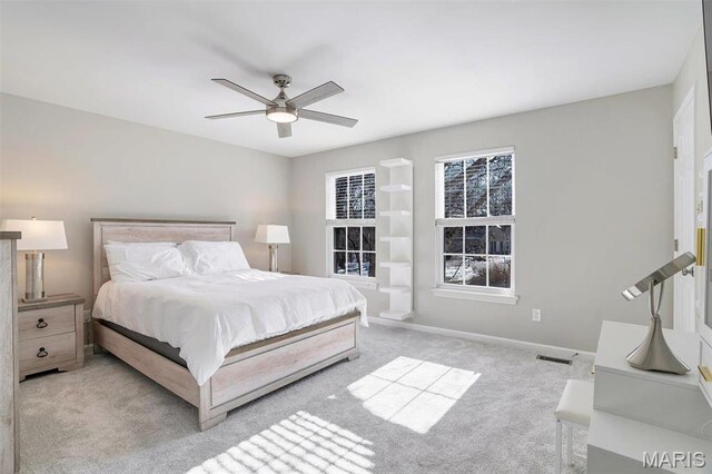 997 Sheffield Forest Ct, Wildwood, MO 63021 - bedroom with light carpet and a ceiling fan