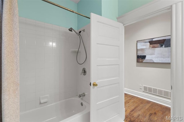 2811 Shenandoah Ave, Saint Louis, MO 63104 - bathroom with bathing tub / shower combination and wood finished floors