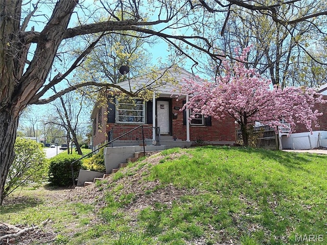 9100 Gedde Ave, Saint Louis, MO 63134 - view of front facade featuring brick siding