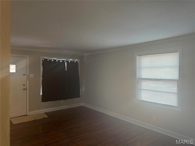 9100 Gedde Ave, Saint Louis, MO 63134 - spare room featuring wood finished floors, baseboards, and ornamental molding