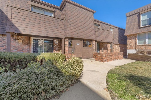 13485 Coliseum Dr Unit G, Chesterfield, MO 63017 - view of front of house featuring brick siding